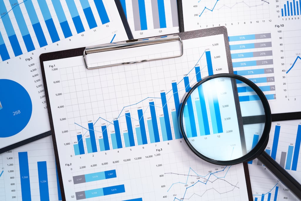 medicus it cloud solutions for healthcare graph and magnifying glass