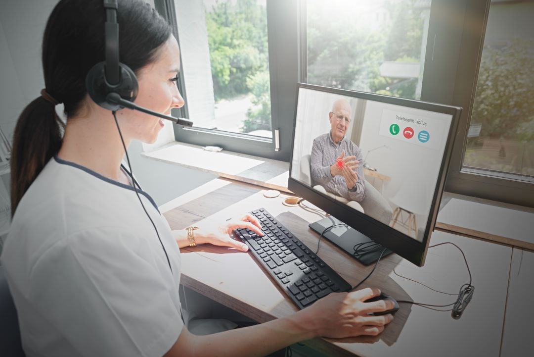 Medicus IT telehealth expert on a remote video call